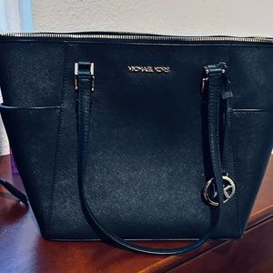 Black Michael kors purse.